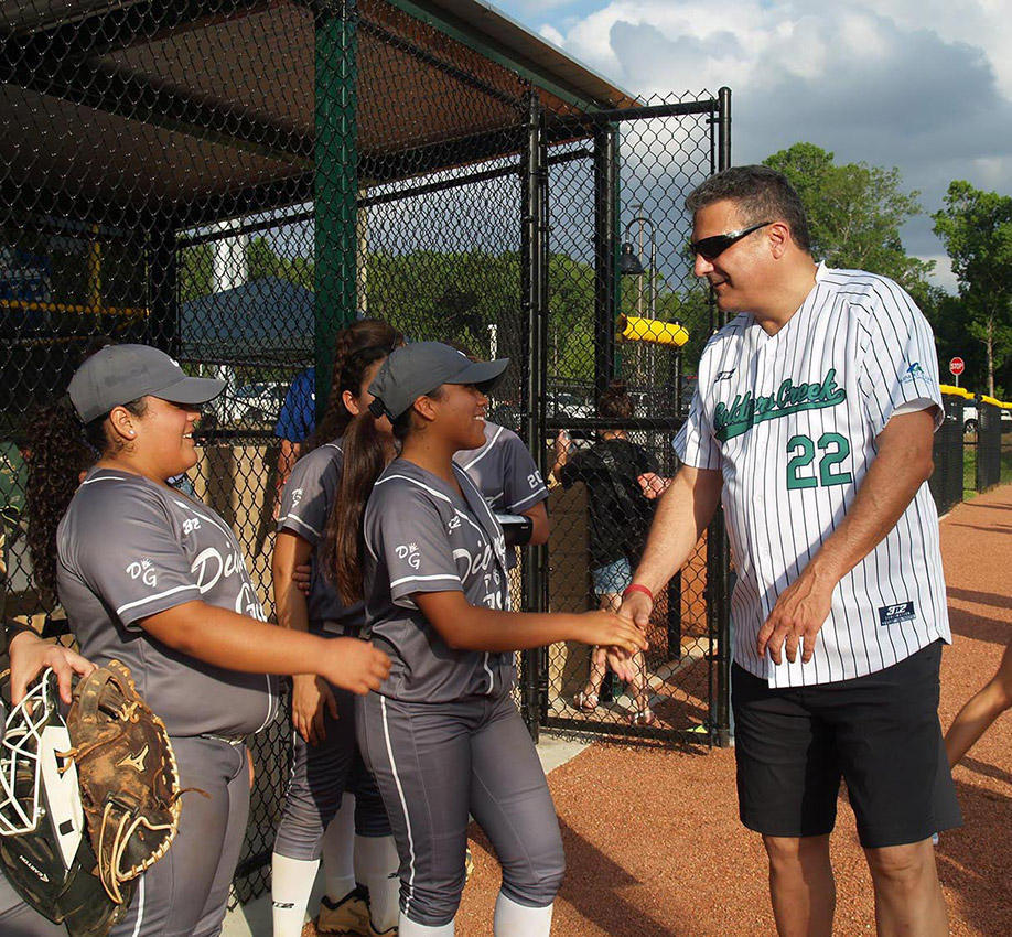 Greeting softball players