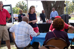 BBQ-Commissioner-Lockhart-conversing-with-small-group-of-attendees_thumb