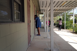 BBQ-former-student-peering-into-old-classrom_thumb
